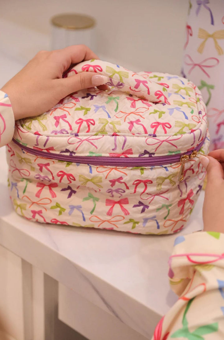 Bow Voyage Quilted Cosmetic Case