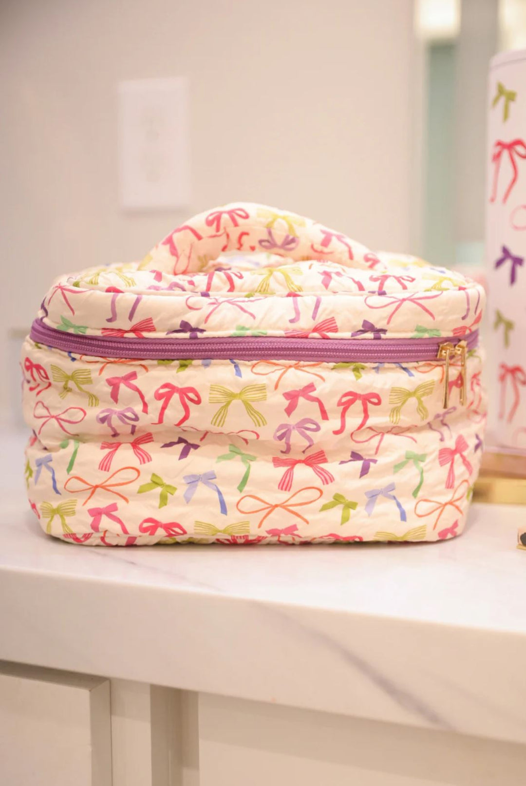 Bow Voyage Quilted Cosmetic Case