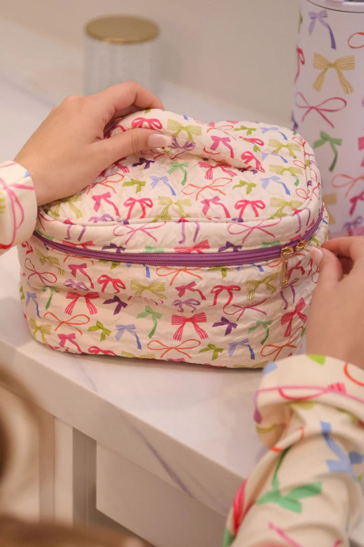 Bow Voyage Quilted Cosmetic Case